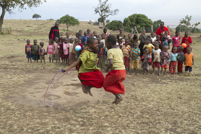 Skipping rope, Engereri Village, Olololoo escarpment, Masai Mara