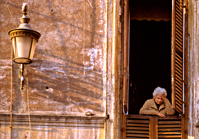 Lady in window, Rome, Italy<